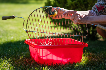 Cleaning grill with monster scrubby sponges