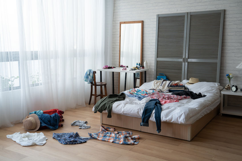 Messy and unorganized bedroom